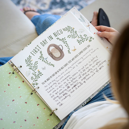 Sunrise to Sunrise NICU memory book First Day in NICU page with handwritten entries and botanical wreath design